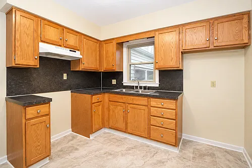Modern 2BR Ranch with Updated Kitchen & Bath, 2 Car Attached Garage and Large Fenced Yard! Washin... — Photo 4