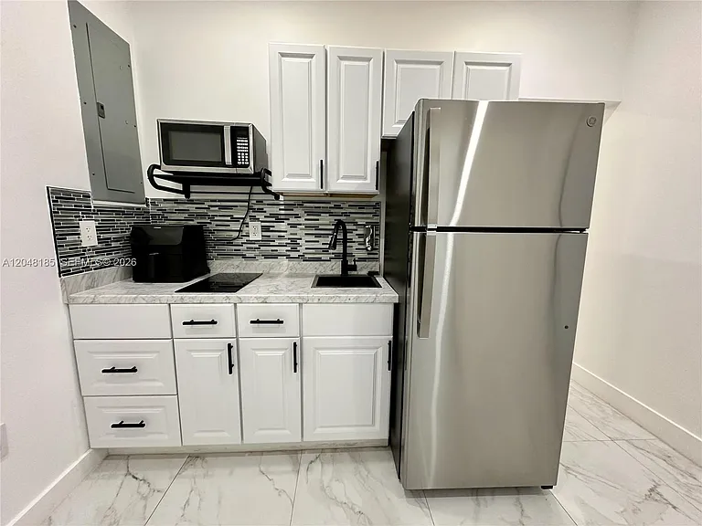 1309 NW 55th Ter #STUDIO — Photo 2
