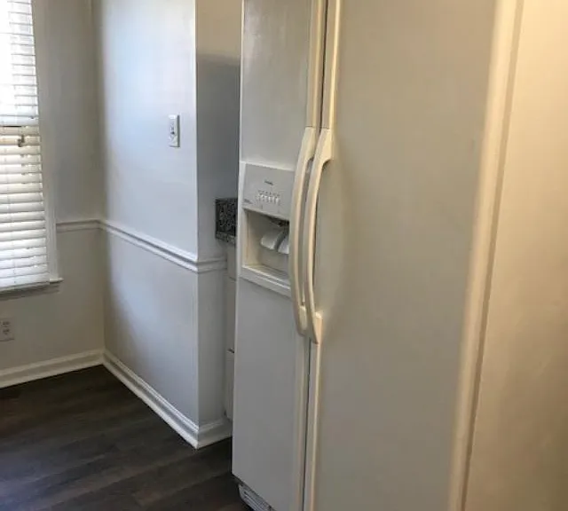 Kitchen eating area and refrigerator