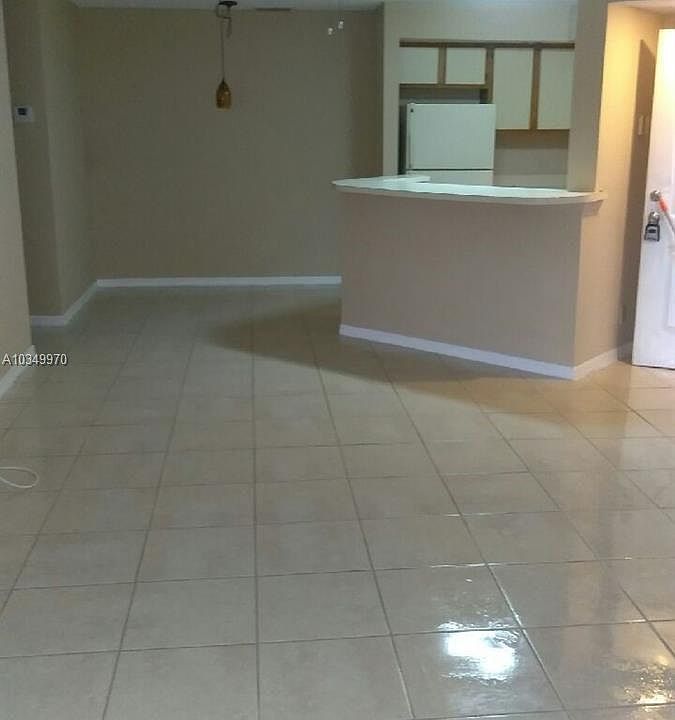 1st image of 3420 Pinewalk Dr N APT 718