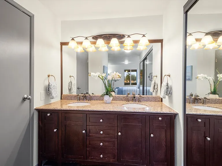 Separate vanity/washroom in primary room.