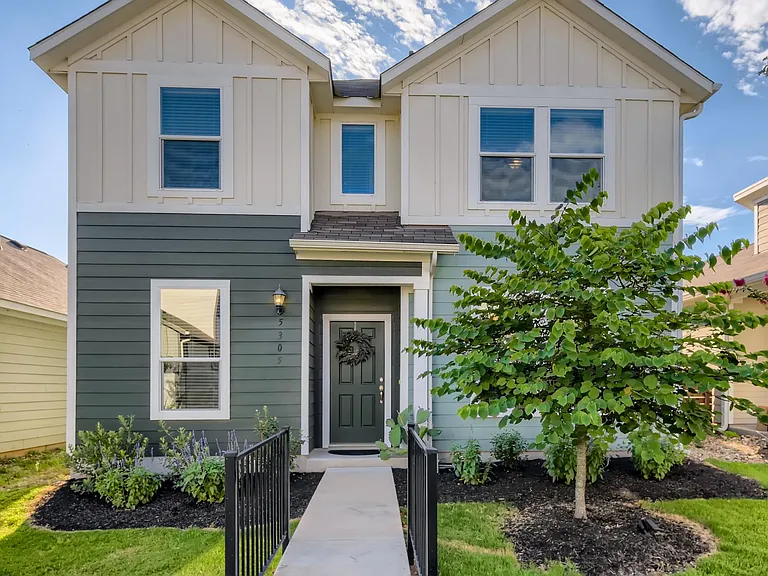 3 bedroom, 2.5 baths, with 2 car garage and back yard