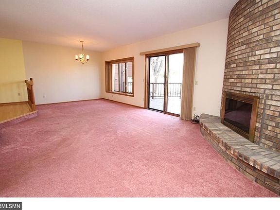 Living room and dining room open up to the deck.
