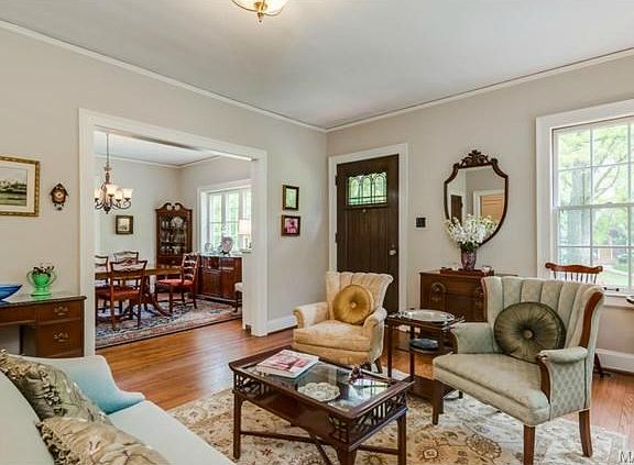 The dining room flows from the living room through a large open