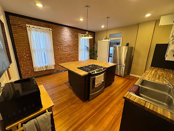 newly remodeled kitchen with large island and tons of natural light (South facing)