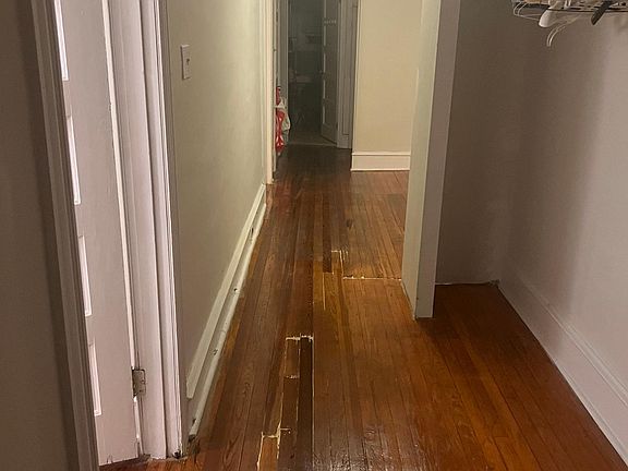 Hallway has 4 closets for storage!!