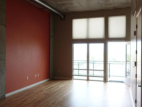 13 foot ceilings and floor to ceiling windows!