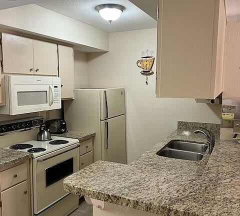 4th image of 4554 E Paradise Village Pkwy N Unit 135