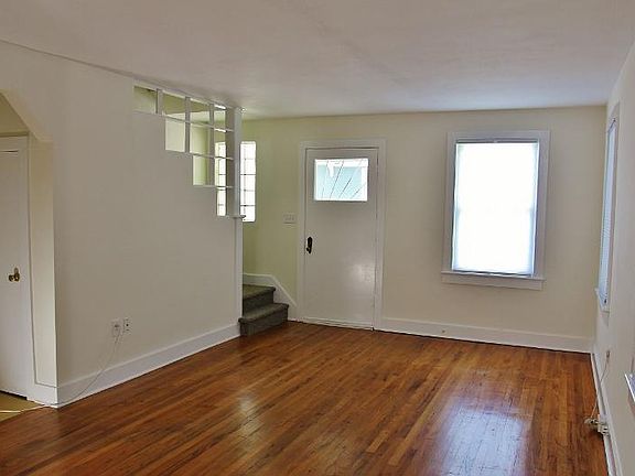 Living Room.
Classic Character and Charm.
Storage Closet/Possible Office Area Under Stairs.