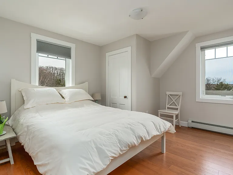 The third floor bedroom with a queen bed. Ocean views.