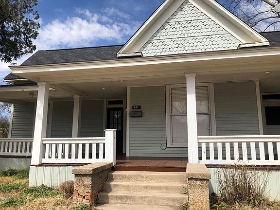 Inviting wrap-around porch
