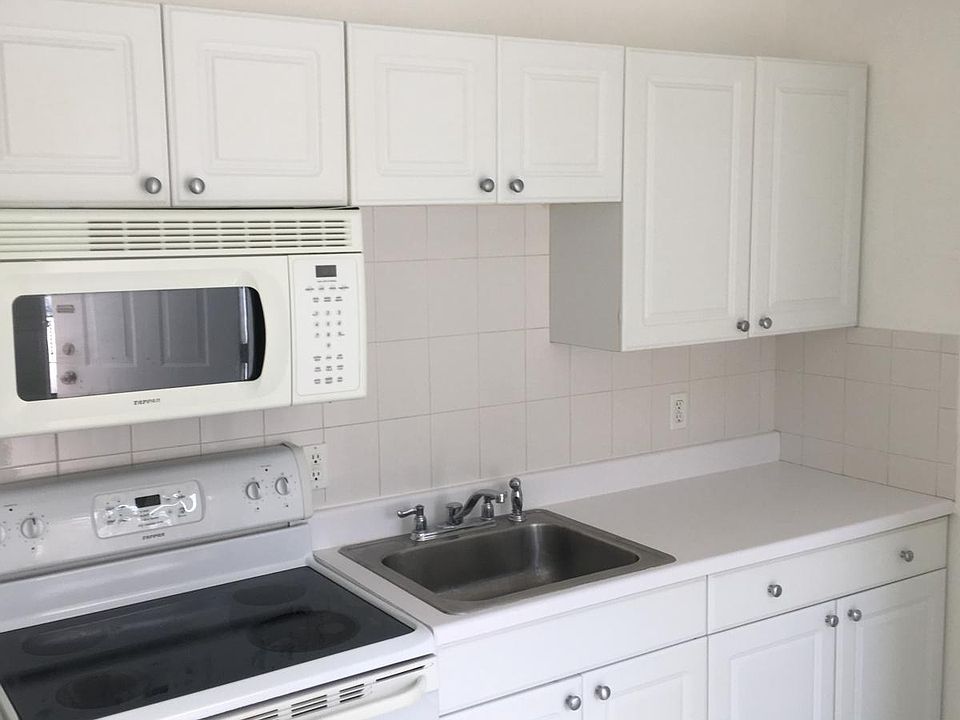 Nice white kitchen area.