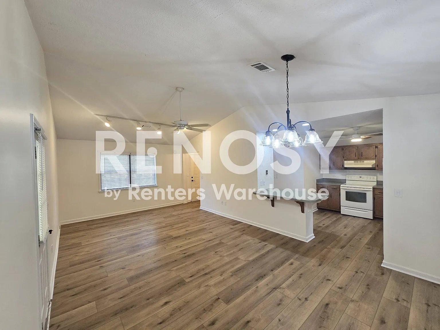 Newly Renovated 3 Bedroom Ranch in the Highly Sought-After Peachtree Ridge School District! — Photo 4