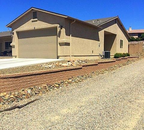 Garage, Patio, Walled backyard.