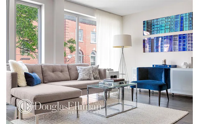 Sold by Douglas Elliman | media 18
