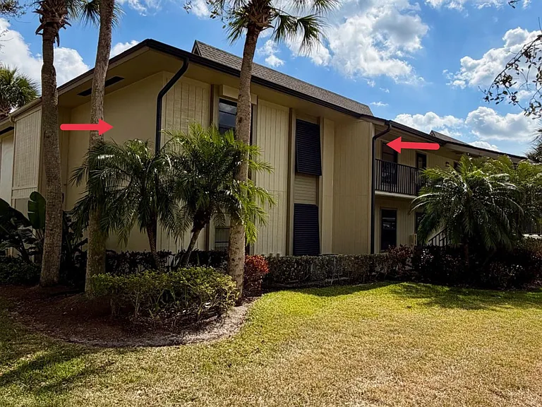 END UNIT w/ spectacular lake & golf course views!