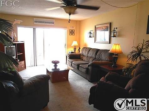 Roomy Living Room with upscale carpet.