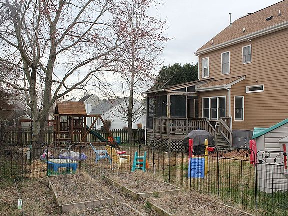Spacious fenced backyard, inluding fenced vegetable area