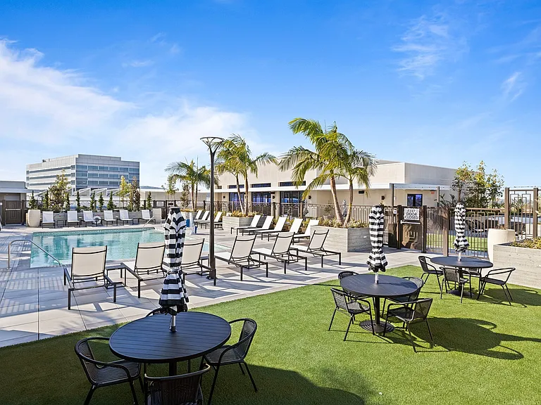 Poolside lounging meets open-air dining.