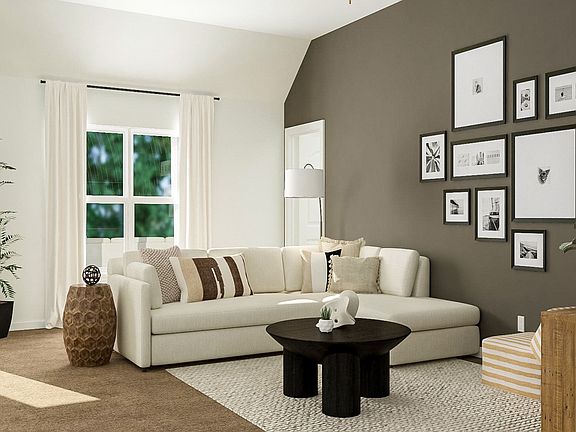 The open kitchen and family room in the Martin are perfect for gathering larger groups.