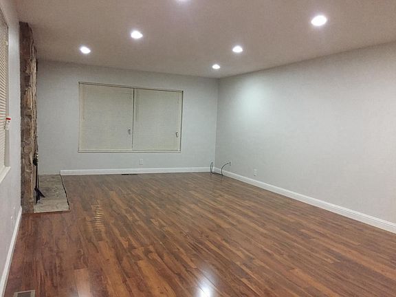 "Great Room" : large combined family room/dining with fireplace