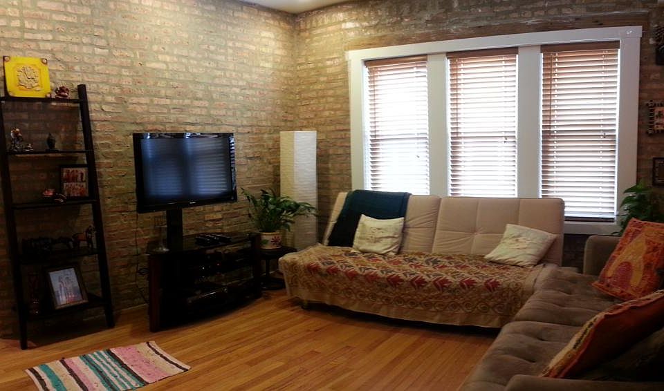 Living Room with exposed brick