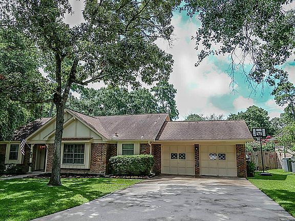 2 car garage, mature, shade trees.