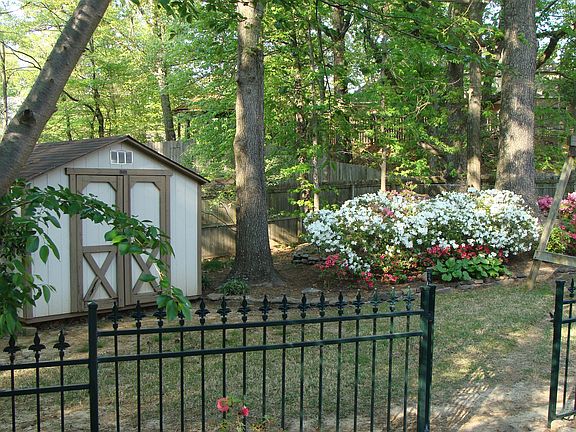 Backyard with enclosed courtyard