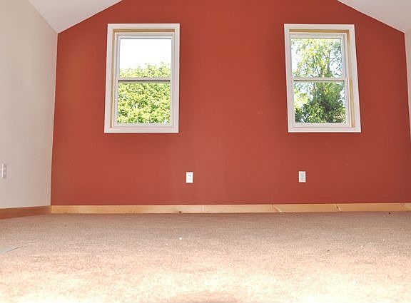 Bedrooms have vaulted ceilings