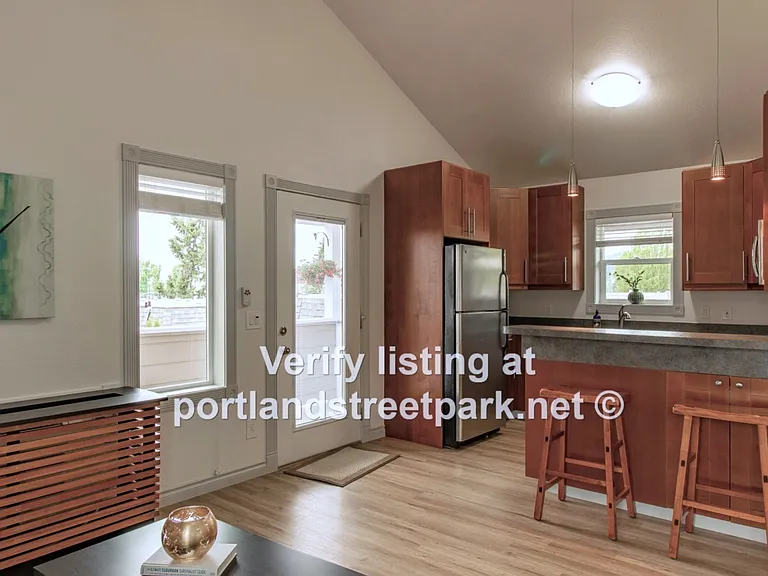 2nd floor unit with windows on all 4 sides