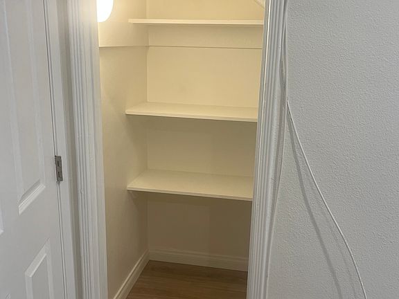 Additional storage closet next to the walk-in closet