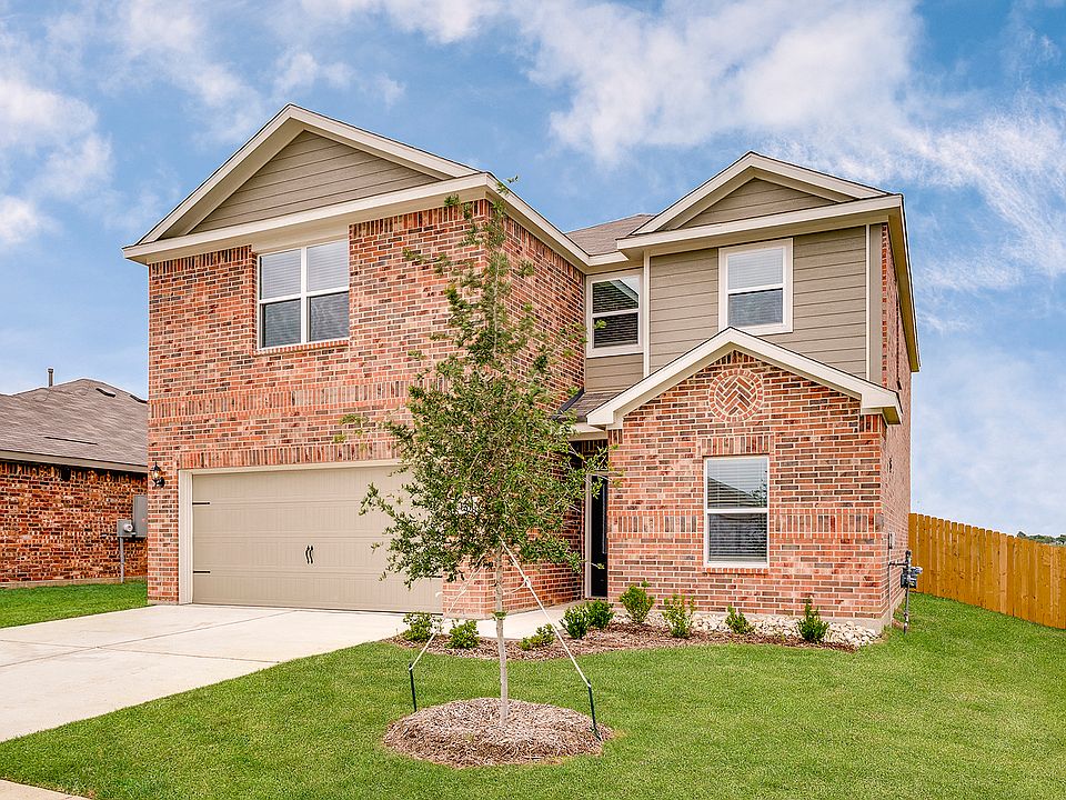 The Driftwood is a two-story brick home.