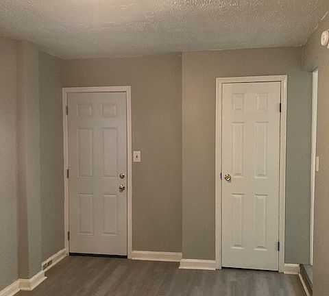 Bedroom # 2 with new floors and doors
