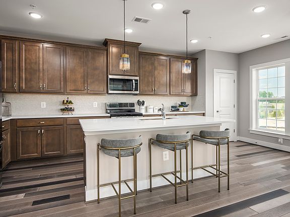 Model Representation - Stunning Kitchen with Stainless Steel Appliances