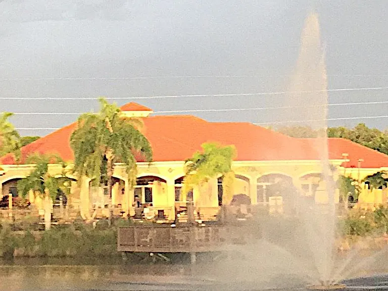 club house with pool on the lake