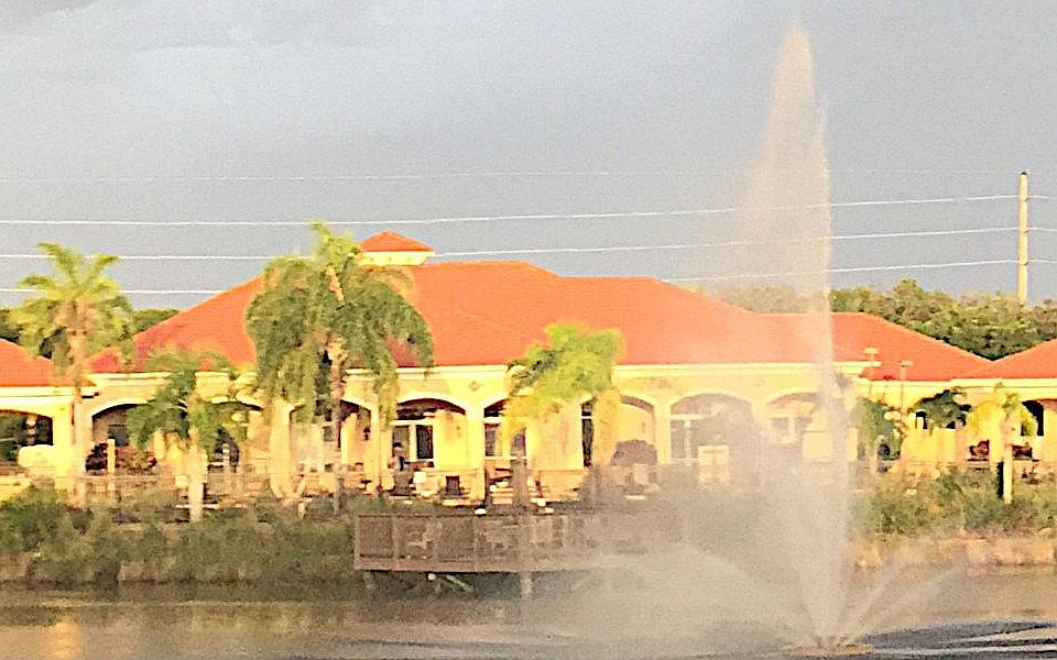 club house with pool on the lake