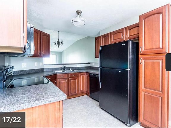 new stainless steel refrigerator was installed and black refrigerator removed.