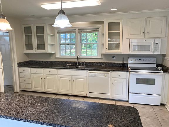 Lots of storage--cabinets & drawers, nice island for eating