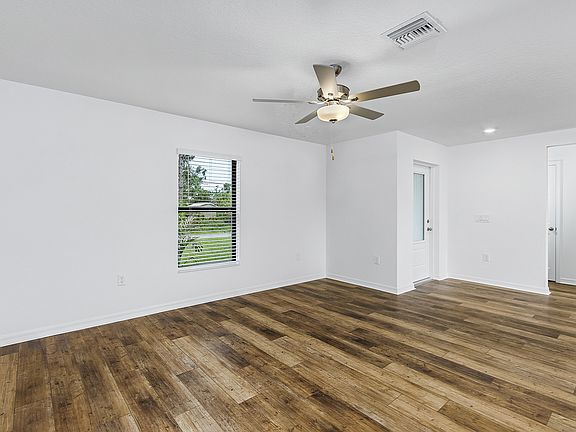 Fall in love with this spacious open concept family room