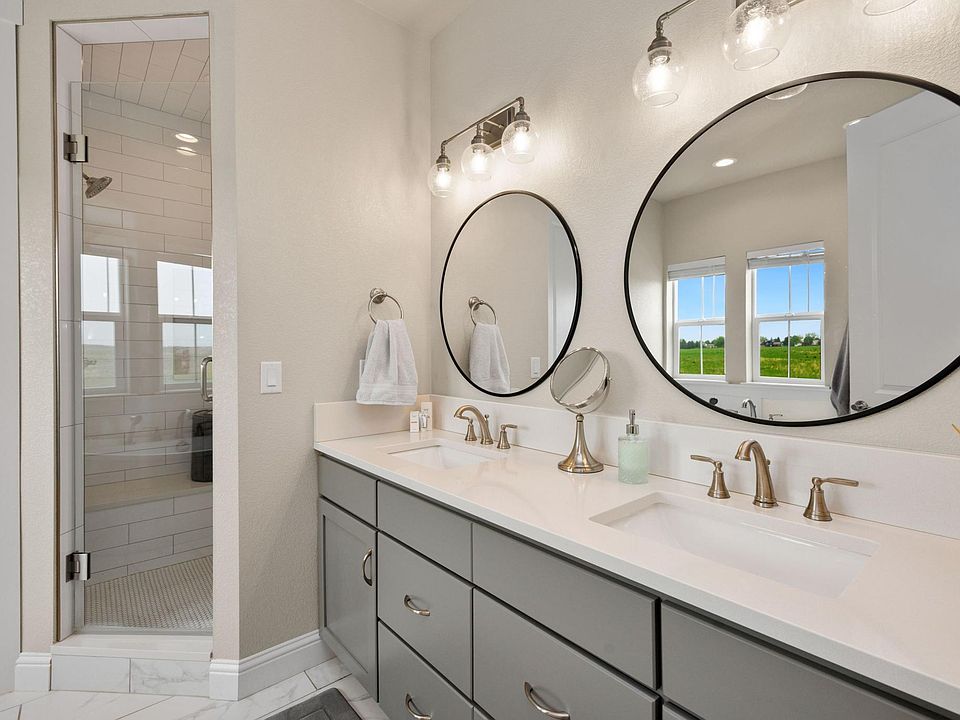 Luxury Master bathroom with dual sinks, dual shower heads and separate soaking tub
