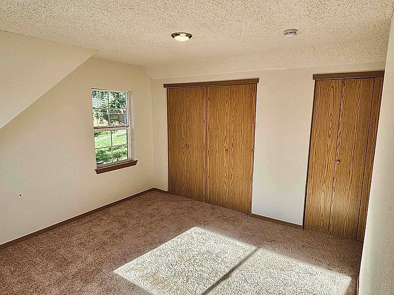 One of the two bedrooms upstairs has twin closets