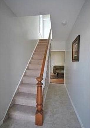Entrance to building. Your apartment is straight ahead--bottom floor.