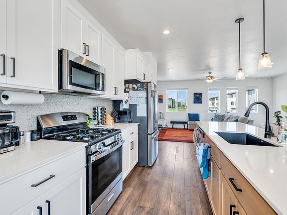 Beautiful kitchen with backsplash and new appliances
