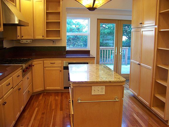 Kitchen with granite counters and french doors
