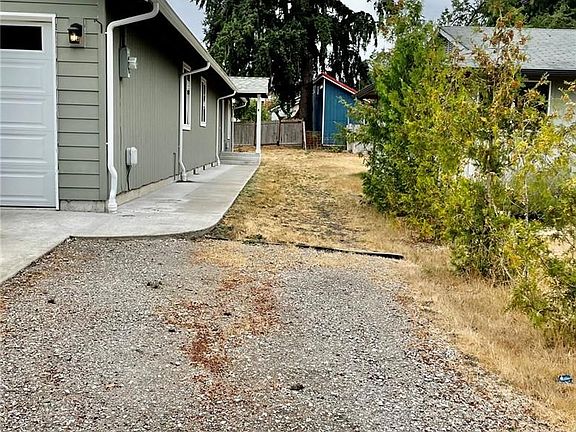 Sidewalk along home leads to 1 bedroom ADU.