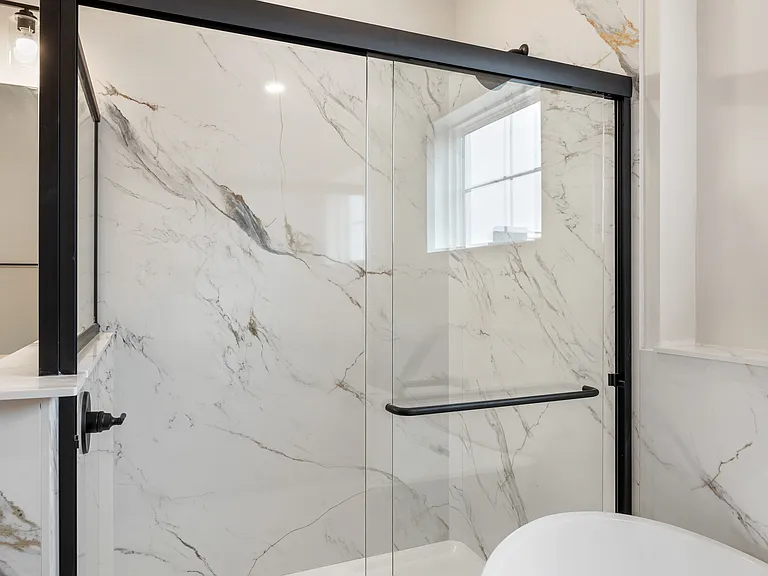 Primary bedroom's en-suite bathroom (2-bedroom floorplan)