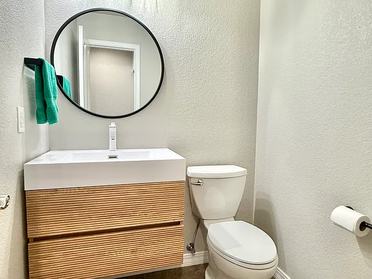 Newly updated main level half bath.