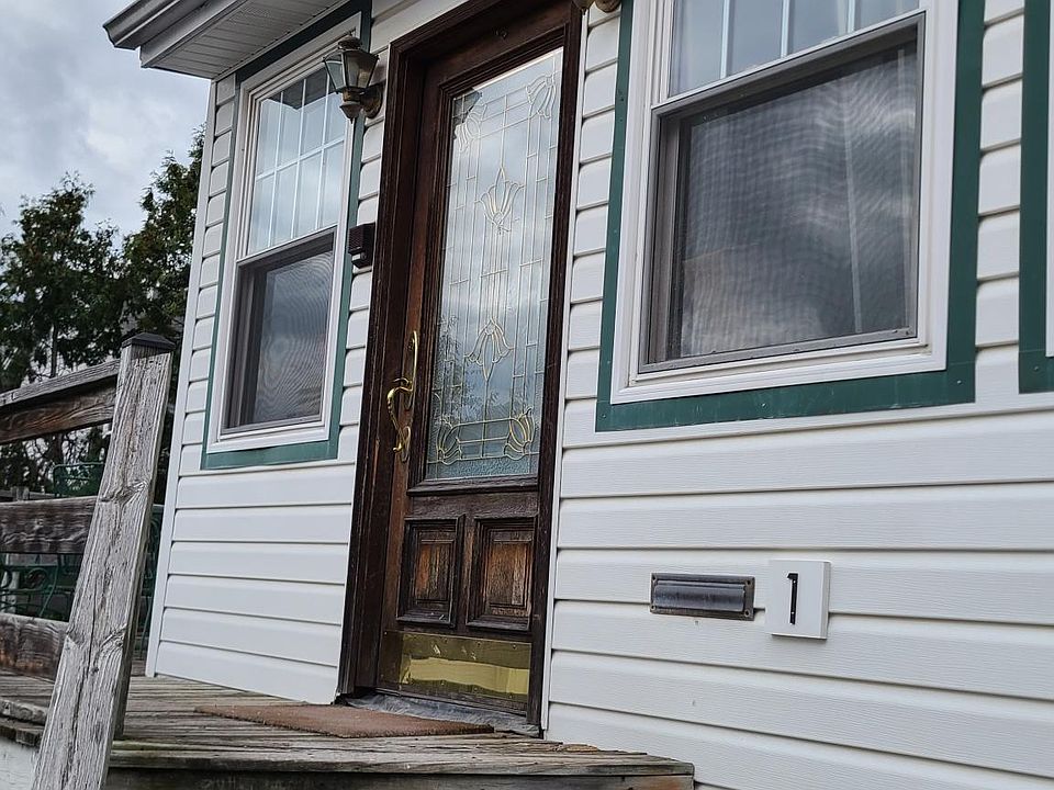 Entrance Door (1 of 2) Closest to Driveway