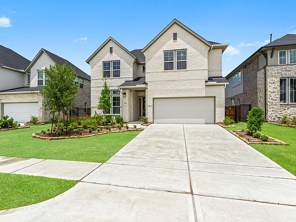 Spacious driveway accommodating up to 6 cars, perfect for guests and family!