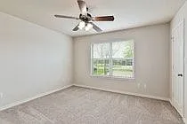 Big windows, walk in closet. This room faces the cul-de-sac, 2 inch faux wood blinds vinloorsyl plank f